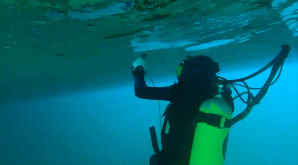 CCTV underwater survey equipment being deployed